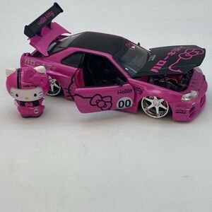 Jada Toys 1/24 2002 Nissan Skyline GTR with Hello Kitty Figure.